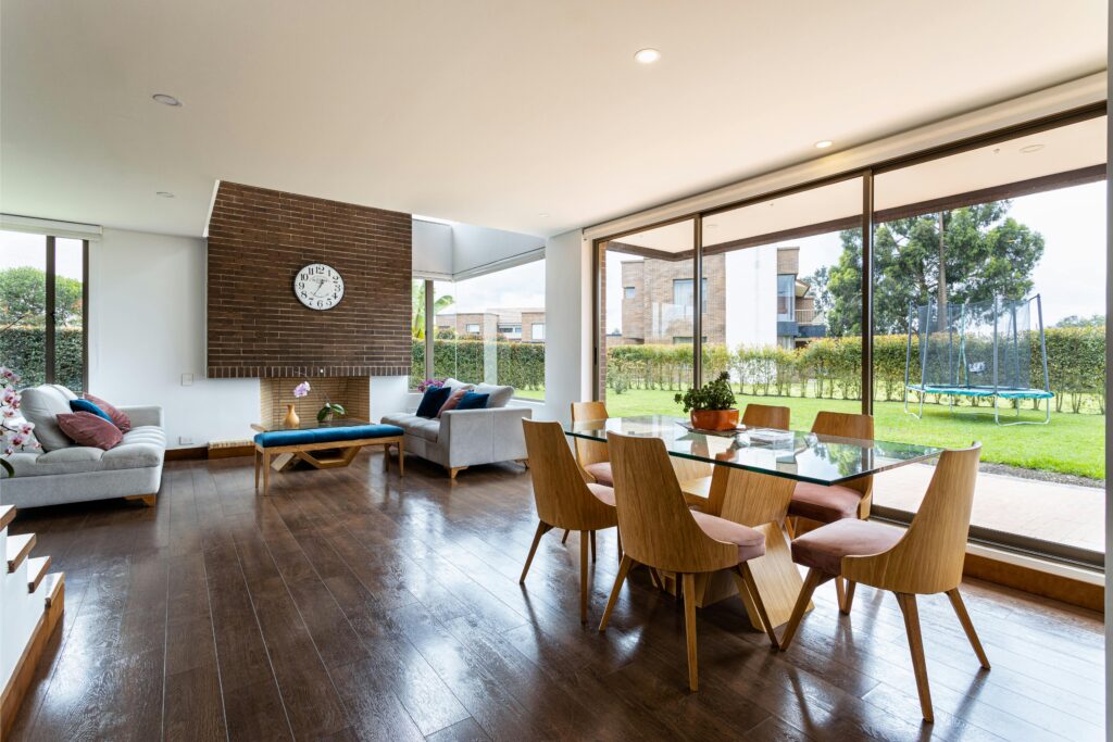 Outdoor lounge space in UAE villa with garden seating and fire pit for guests