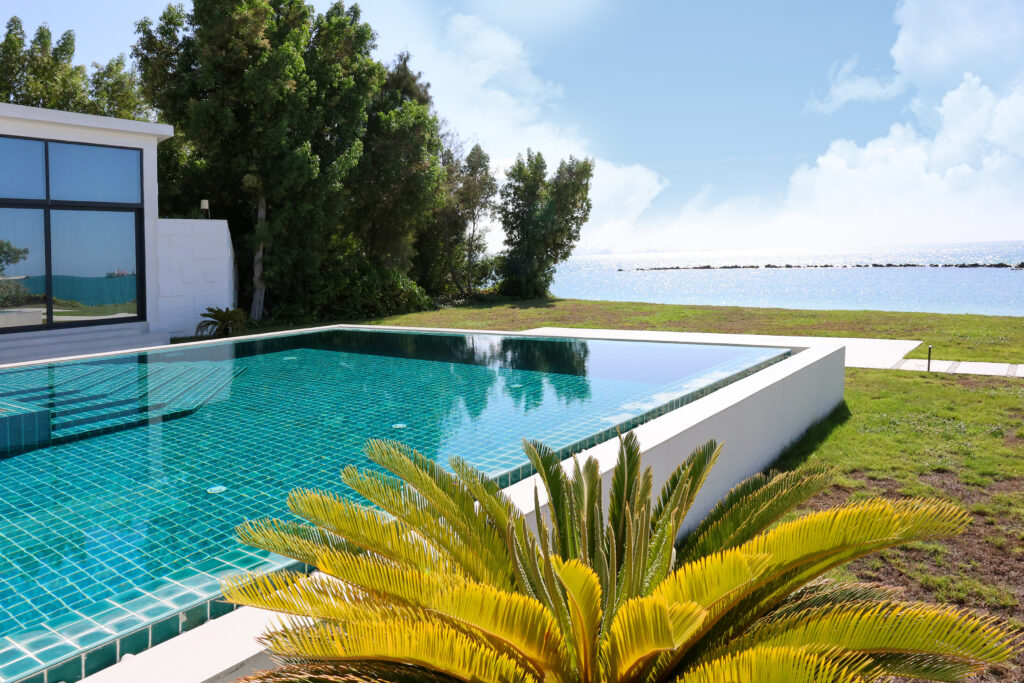 Private pool and sunbathing area in a luxury villa in Abu Dhabi without crowds