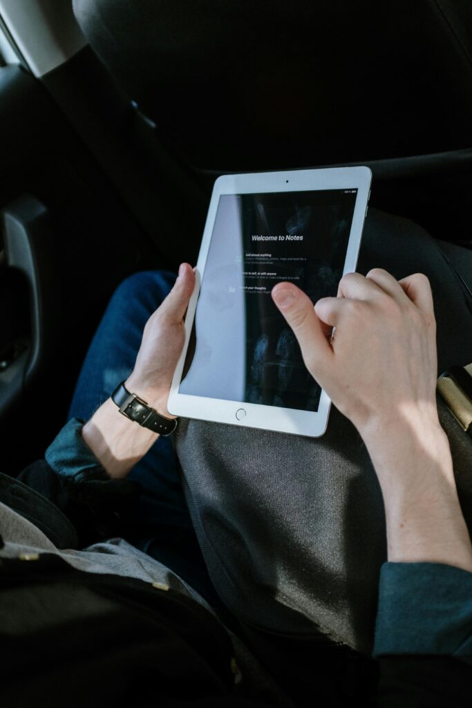 The owner manages bookings on the tablet.