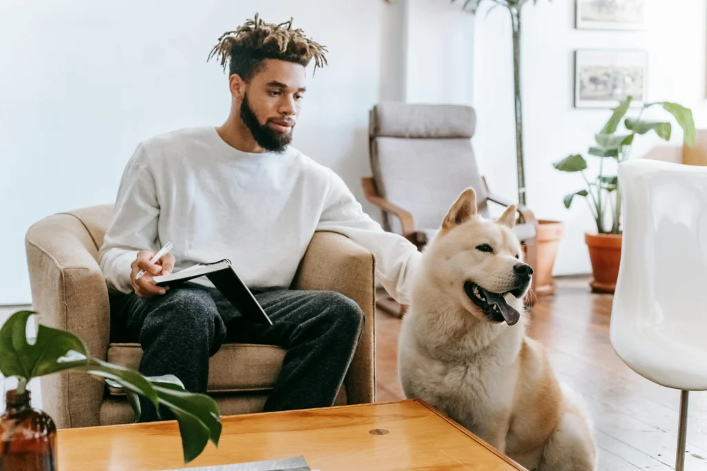 Owner with pet in Dubai apartment