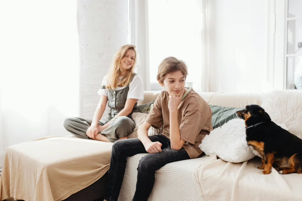 Pet-friendly holiday home in Abu Dhabi with spacious living area for dogs compared to small hotel room.