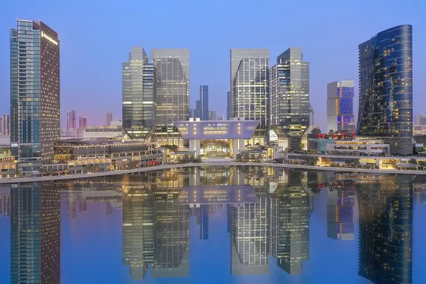 Al Maryah Island Abu Dhabi with luxury shopping mall and waterfront view.
