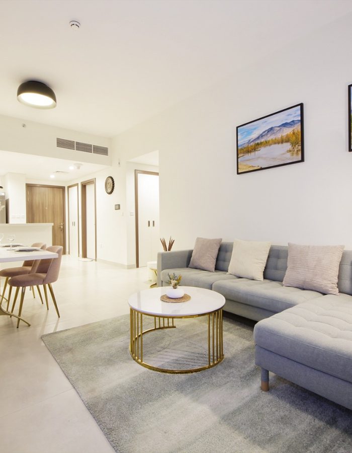 Stylish living room with dining area and artwork
